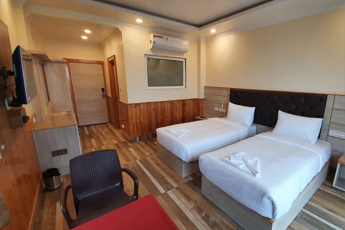 Twin room at the Nomadic Inn, Dharamshala Photo: Host / KVT India