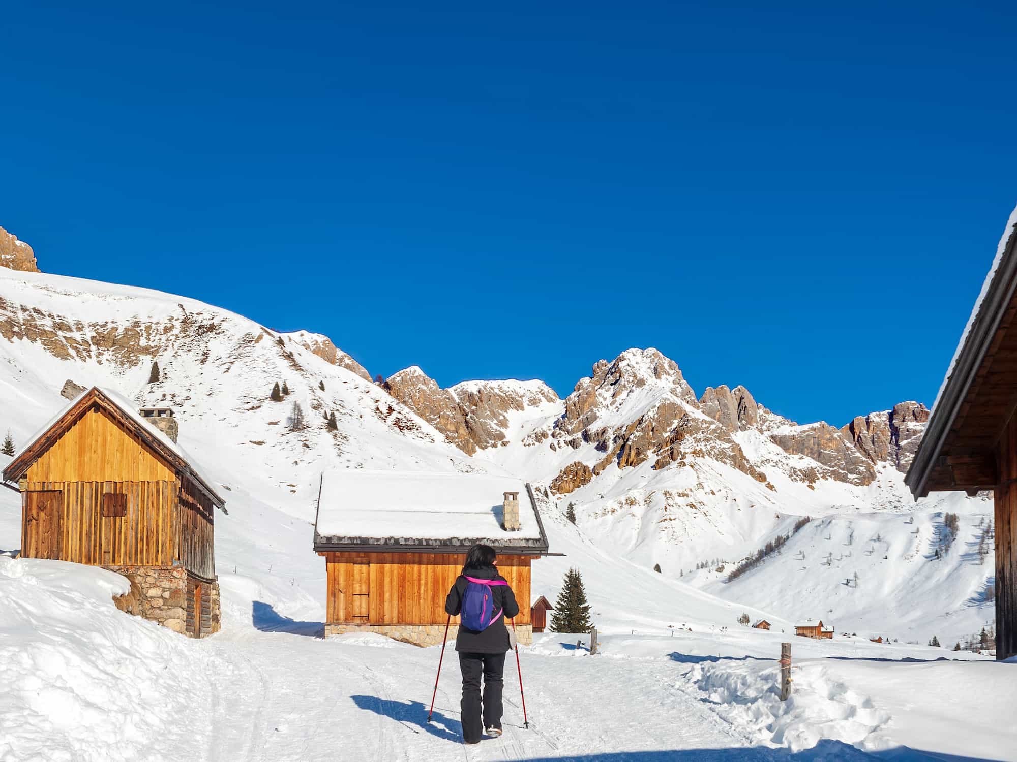 Woman hiking in Valfredda e Fuciade, Dolomites, Italy.