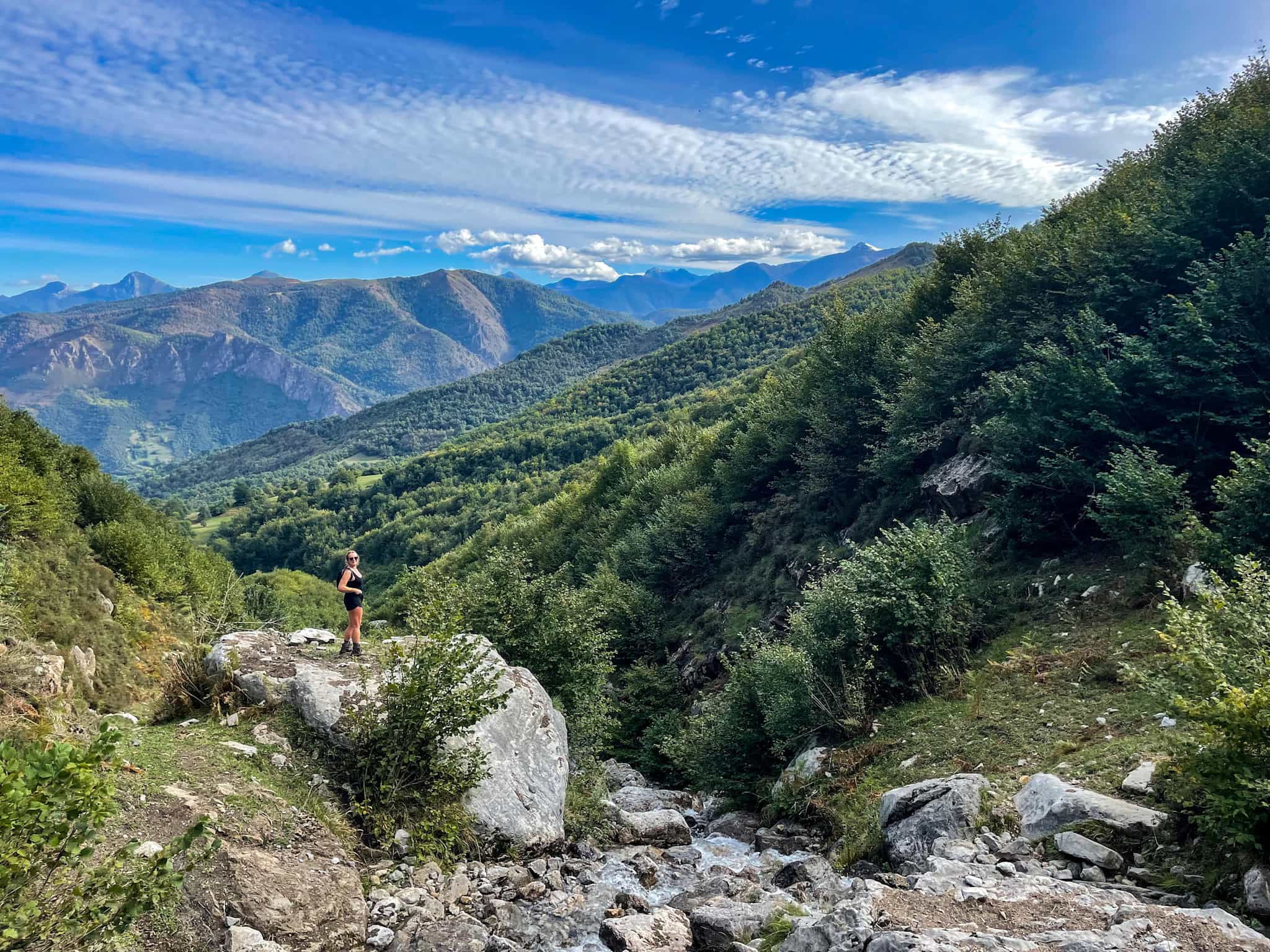 Girl on a hiking trail near Espinama, Picos de Europa. Spain.