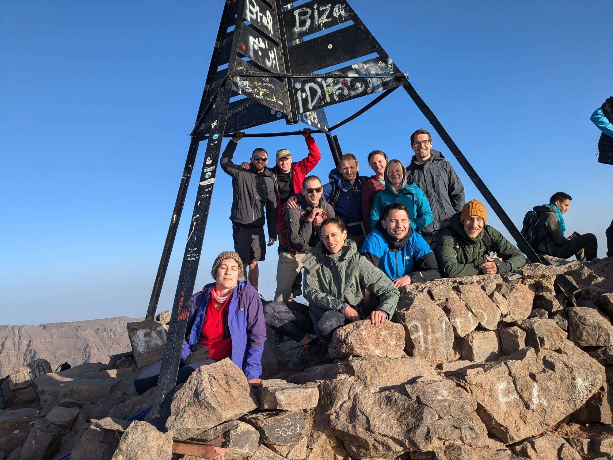 Posing on the summit of Mount Toubkal