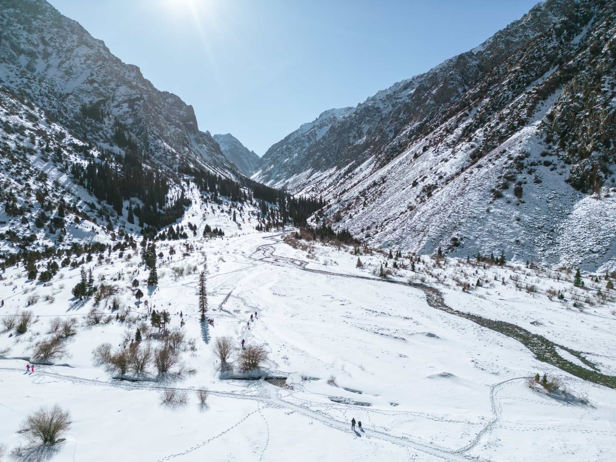 Hikers crossing the snow in Ala Archa National Park, Kyrgyzstan Photo: GettyImages-145882129