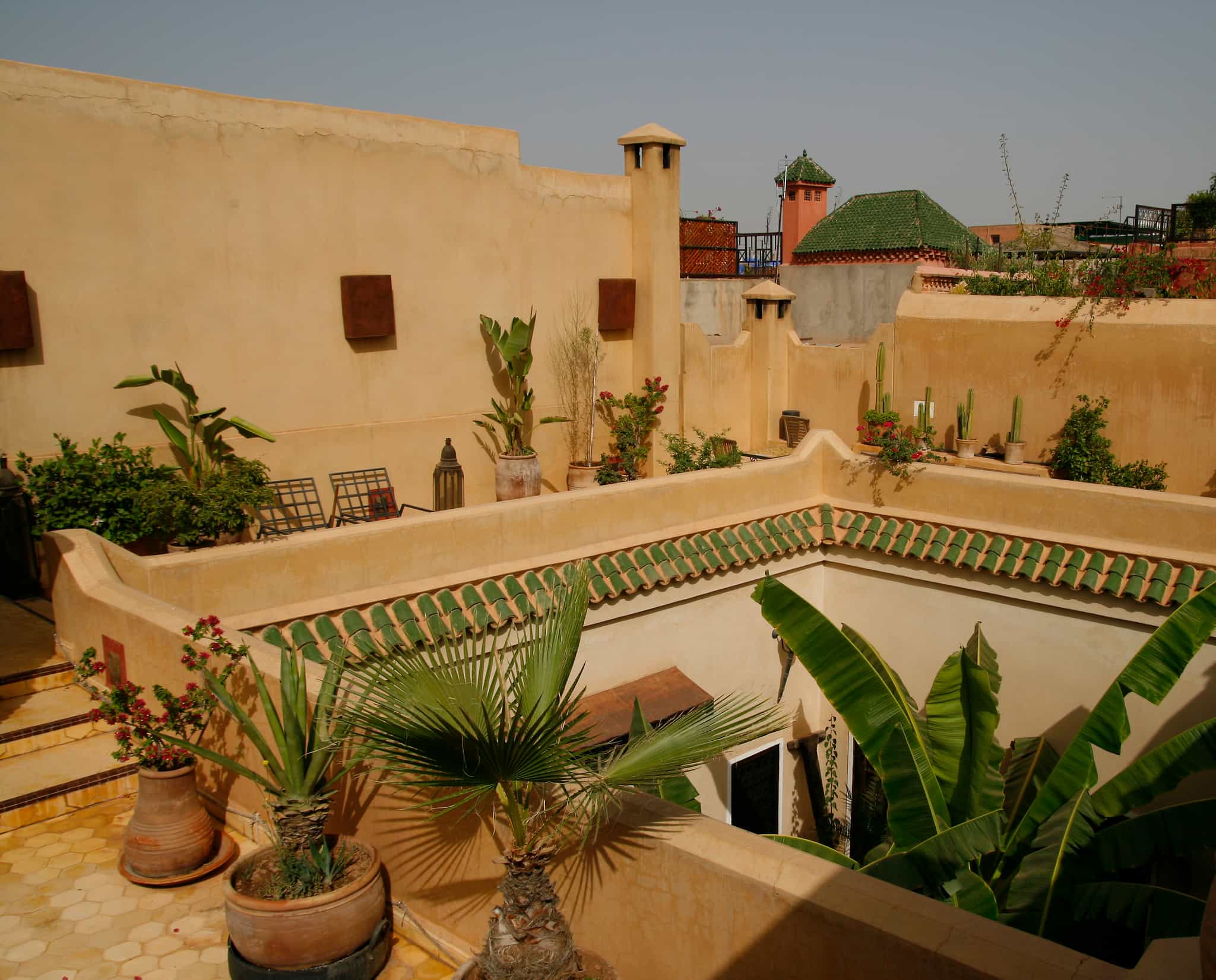 A rooftop view of a traditional riad in Marrakesh, Morocco.