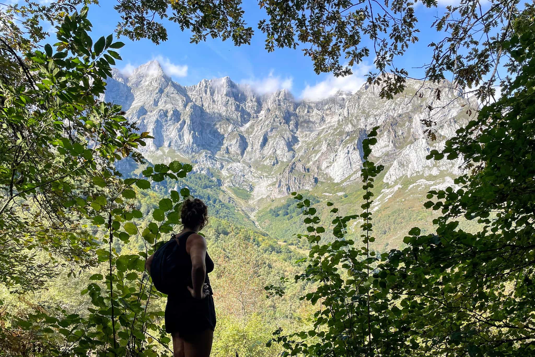 Girl on a hiking trail near Espinama in Picos de Europa, Spain.