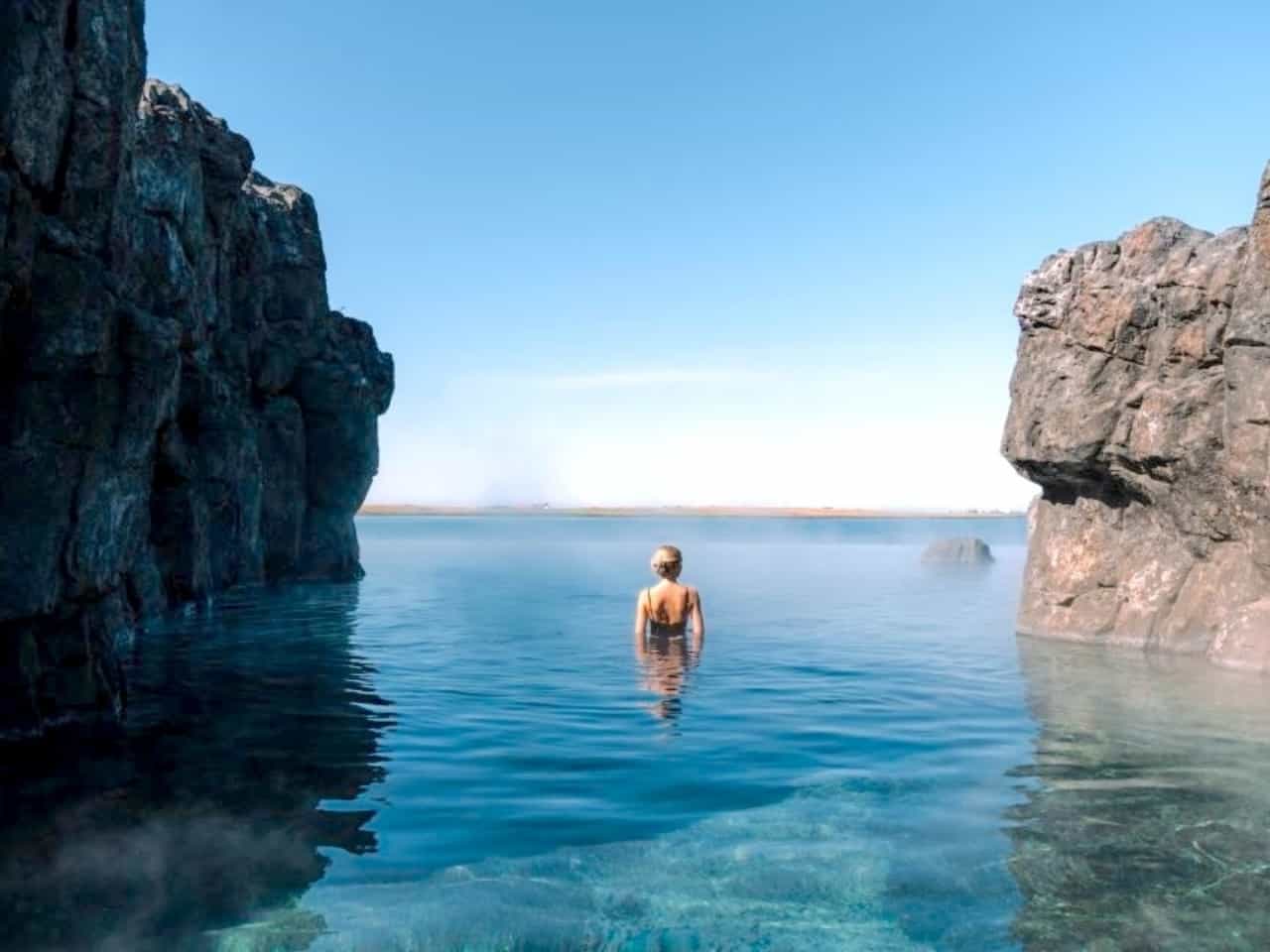 Woman bathing in a geothermal pool at the Sky Lagoon in Reykjavik. Photo: Sky Lagoon