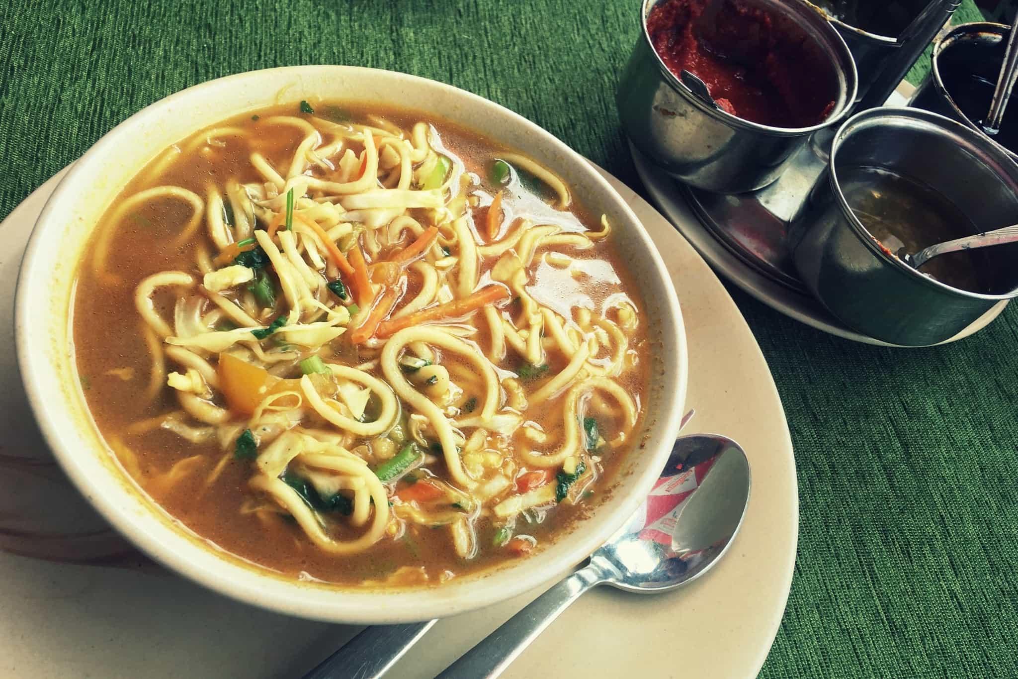 Thukpa indian noodles ladakh- Photo. canva link: https://www.canva.com/photos/MADnQQCGPU4-thukpa-tibetan-noodle-soup-with-spicey-chutney-served-in-leh-ladakh/