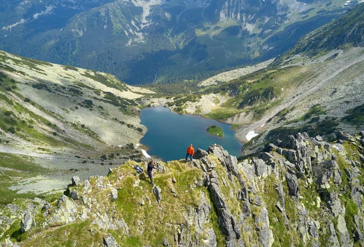 Aerial view of glacial lake in the Retezat Mountains, Romania. Photo: host, Apuseni.